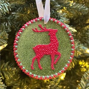 Festive Green and Red Reindeer Ornament